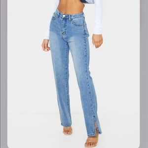Mid blue wash split hem straight leg jeans